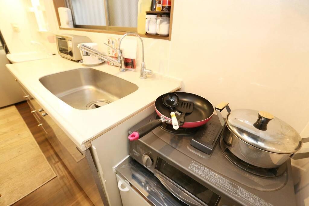 Takemura Building106 Apartamento *